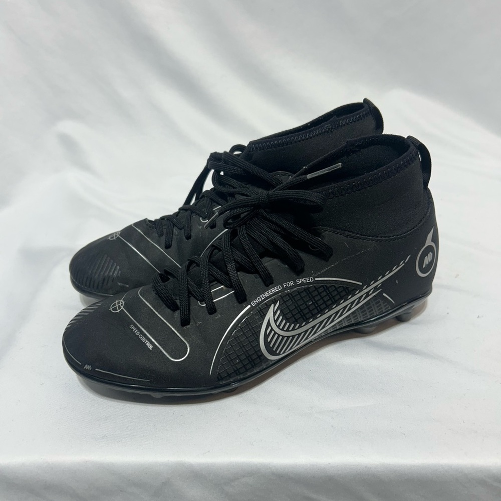 Nike mercurial Black Soccer Cleats unisex. With sock design. 6 youth.